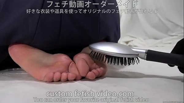 شاهد مقاطع دافئة Tickle the soles of women's feet with a fork and a hairbrush